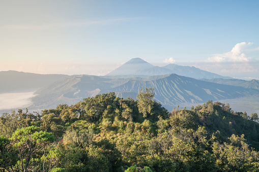 Beautiful view of Bromo national park and spectacular volcanoes in Indonesia. Travel destinations tourism concept