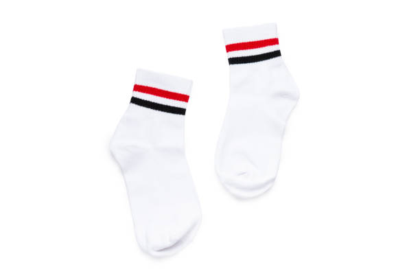 istock White short socks with red and black stripes in pair isolated (Clipping path included) on white background, kid or children school supplies or personal dress set 1037620710