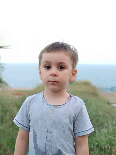 istock Little boy portrait on the beach 1037623462