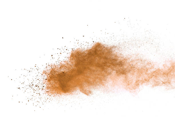 istock Abstract brown colored soil splash on white background. Color dust explode on background by throwing freeze stop motion. 1037633340