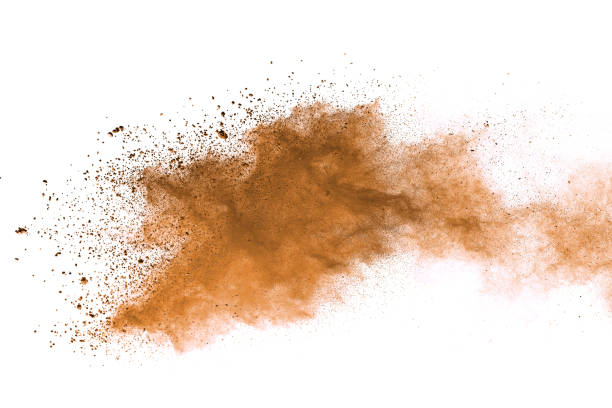 istock Abstract brown colored soil splash on white background. Color dust explode on background by throwing freeze stop motion. 1037633374