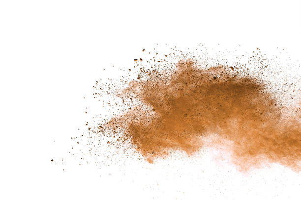 istock Abstract brown colored soil splash on white background. Color dust explode on background by throwing freeze stop motion. 1037633522