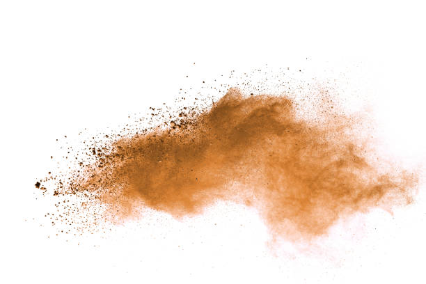 istock Abstract brown colored soil splash on white background. Color dust explode on background by throwing freeze stop motion. 1037633660