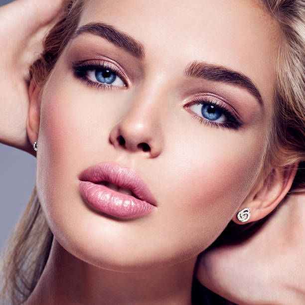 istock Young Woman with beautiful face 1037643090
