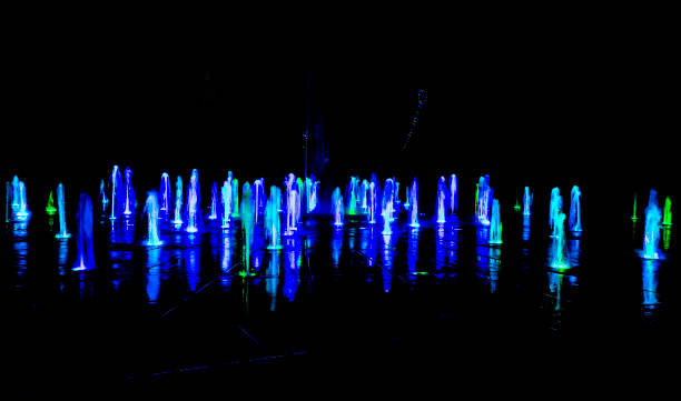 istock Illuminated water splash by night in  Torun, Poland 1037666554