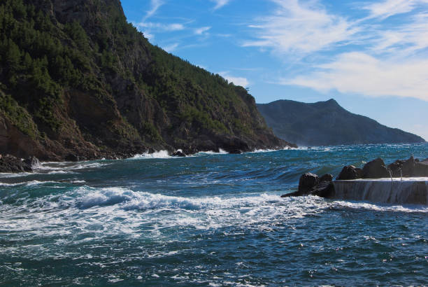 SEA AND MOUNTAIN  IN VALLDEMOSA HARBOUR, MAJORCA, SPAIN
