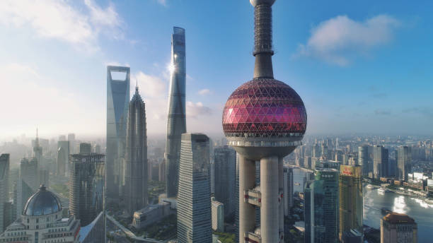 Aerial View of Oriental Pearl TV Tower in Shanghai after Sunrise Photo by Dji Phantom 4pro after sunrise. shanghai world financial center stock pictures, royalty-free photos & images