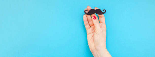 istock Paper moustaches for men fathers dad concept 1037673452