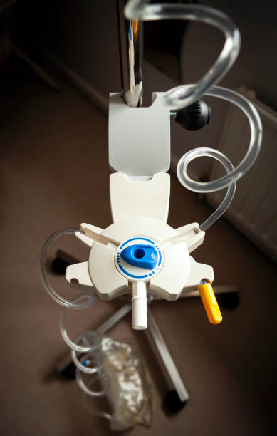 Drip stand organiser for Peritoneal dialysis, with dial switched to the finished position. Bag of fluid is full on the floor. Drip stand organiser for Peritoneal dialysis, with dial switched to the finished position. Bag of fluid is full on the floor. peritoneal dialysis photos stock pictures, royalty-free photos & images