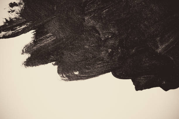 istock Strokes of black paint on a white background 1037673890
