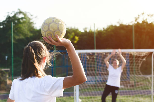 istock Handball player trowing a ball 1037674246