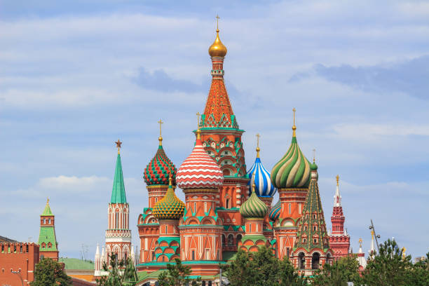 istock St. Basil's Cathedral on Red square against Moscow Kremlin on a cloudy summer day 1037683594