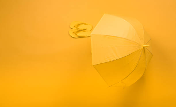 istock beach accessories on the yellow background , summer is coming concept 1037689972