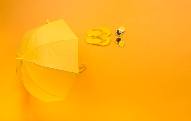 istock beach accessories on the yellow background , summer is coming concept 1037690616