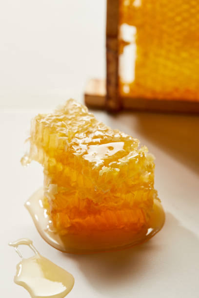 istock close up view of stack of beeswax on white surface 1037699550