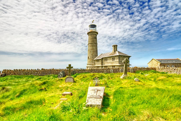 Lighthouse on the coastline entering the harbour into Ramsey