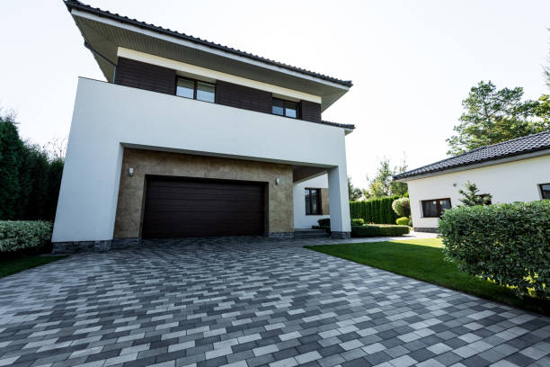 istock facade of new modern house with empty parking and lawn 1037713108