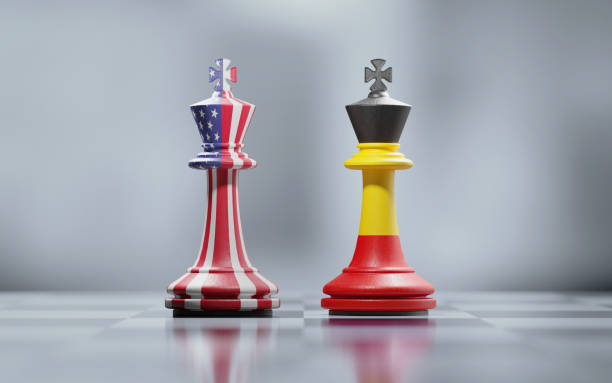 istock Two King Chess Pieces Textured With American And German Flags On Black And White Chessboard 1037713210