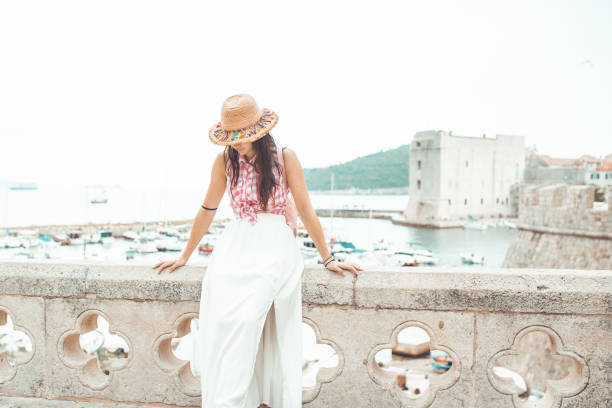istock Young Lady relax in Dubrovnik, Croatia 1037722002