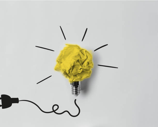 istock top view of crumpled paper as light bulb with drawn plug 1037727036