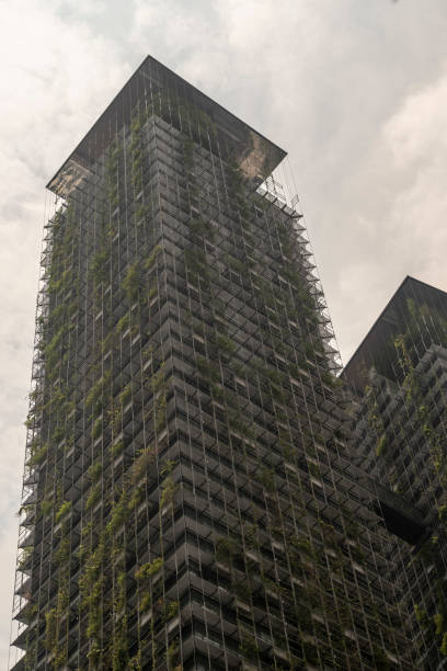 istock Skyscraper in Kuala Lumpur with Lush External Plant Life 1037727466