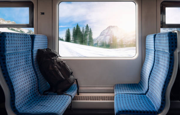 Old-fashioned train compartment interior in old railroad car.