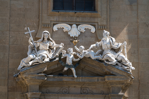 Sculptures at the San Filippo Neri church facade in Florence, Italy
