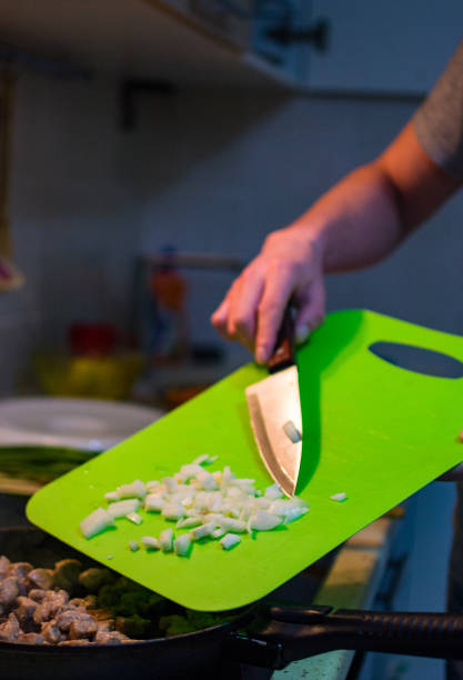 add onions to the meat in a frying pan