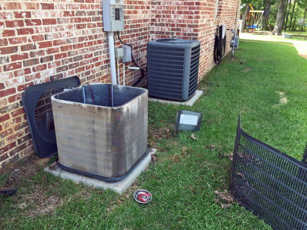 air conditioner maintenance, cleaning condenser coils - condenser imagens e fotografias de stock
