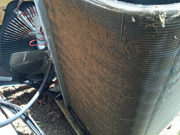 air conditioner dirty condenser coil that needs cleaning - condenser imagens e fotografias de stock