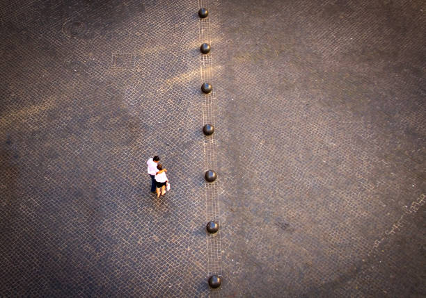 Paris, France - September 9, 2014: Paris - Fountains at Tracadero. Two tourists rest tired of sightseeing in Paris