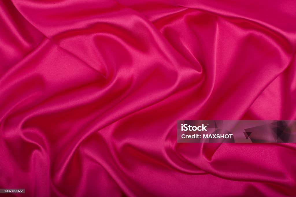 Pink, artistic fabric texture. Pink abstract background luxury cloth or liquid wave. Pink Color Stock Photo
