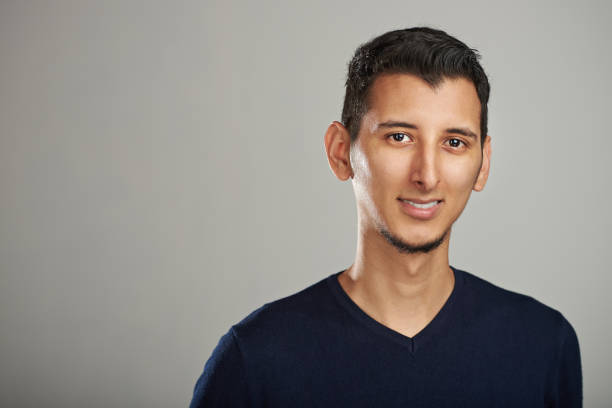 istock Attractive portrait of young hispanic man 1037788776