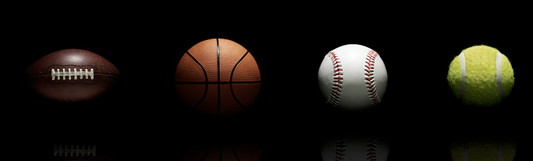 Balls of Favorite sports on black background