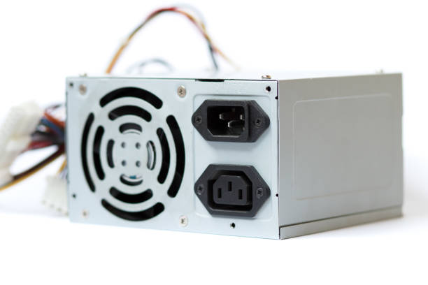 grey power supply for the computer with cables unit for pc on white background.
