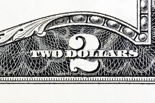 istock Two dollar bill, super macro shot. High resolution photo. 1037816854