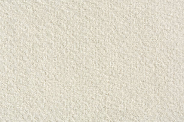 istock Creme paper texture on macro. High resolution photo. 1037816880