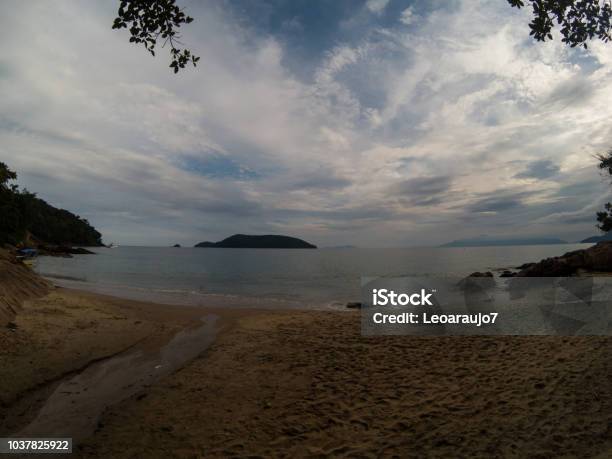 Beautiful And Calm Beach On A Late Afternoon Stock Photo - Download Image Now - Bay of Water, Beach, Blue