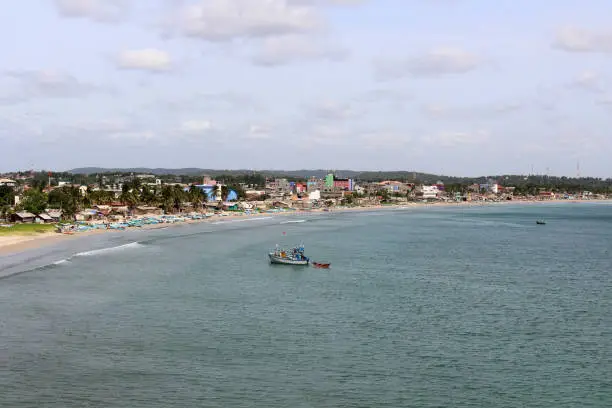 Photo of The boats are lining in the quiet sea of Dutch Bay in Trincomalee.