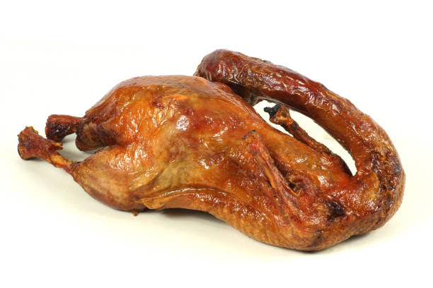 istock Traditional Peking Duck on white background 1037899812