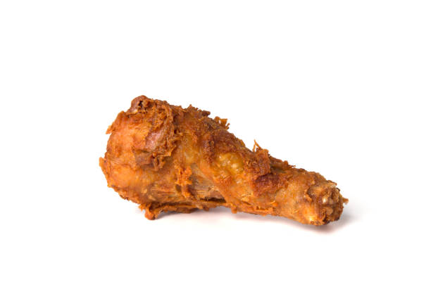 istock Crispy fried chicken leg isolated on a white background 1037935184