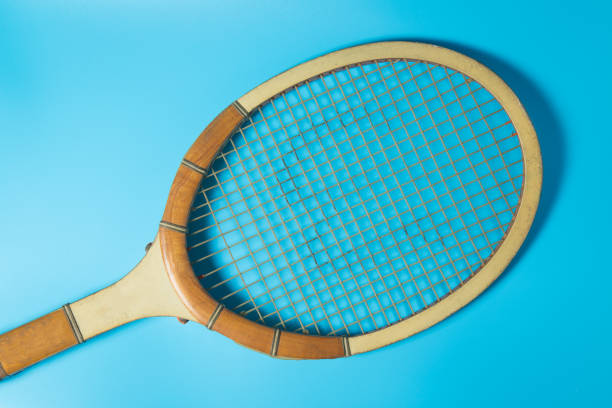 istock Tennis racket on blue background. Sport equipment. Flat lay. 1037935518