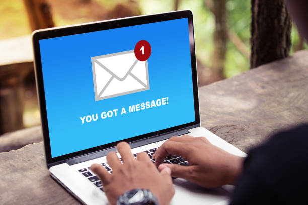 You've got a mail message on laptop screen concept stock photo