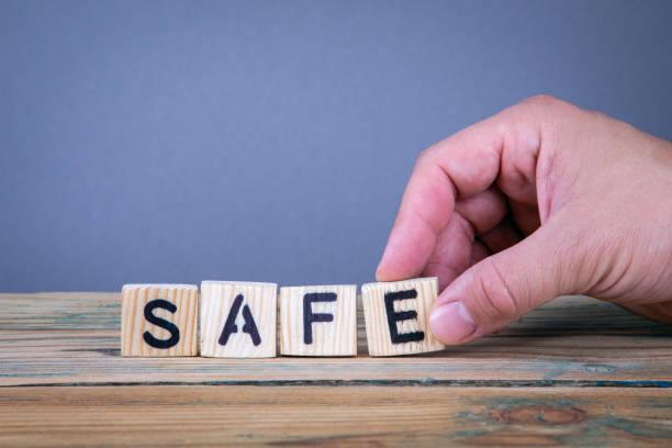 istock safe. Wooden letters on the office desk 1037966164