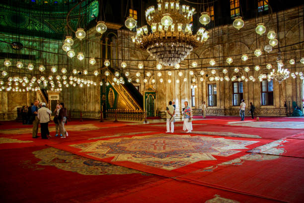 lights and  red carpet inside the alabaster mosque in cairo - cairo mosque egypt inside of imagens e fotografias de stock