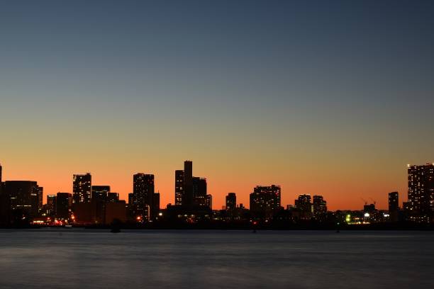 Urban landscape around Tokyo bay at dusk in horizontal frame