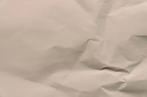 istock Old and vintage background by crumpled paper texture and free space for text. 1037973802