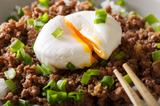 istock Beef Soboro with egg benedict and green onion macro. horizontal 1037984498