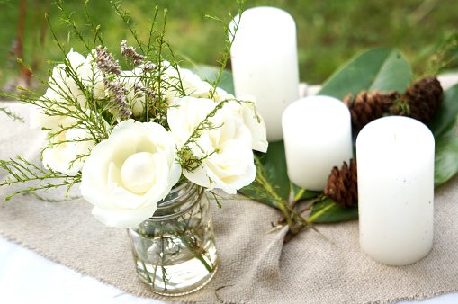 white flowers and candles