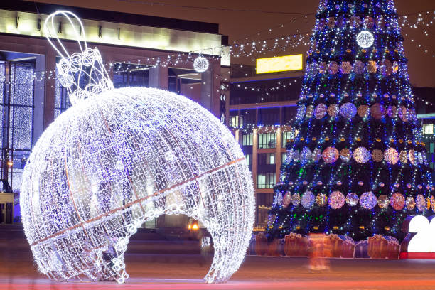 istock Minsk, Belarus - january 9, 2018: New Year tree decorated with decorations and lights on the square in festive Minsk for Christmas. 1037994818